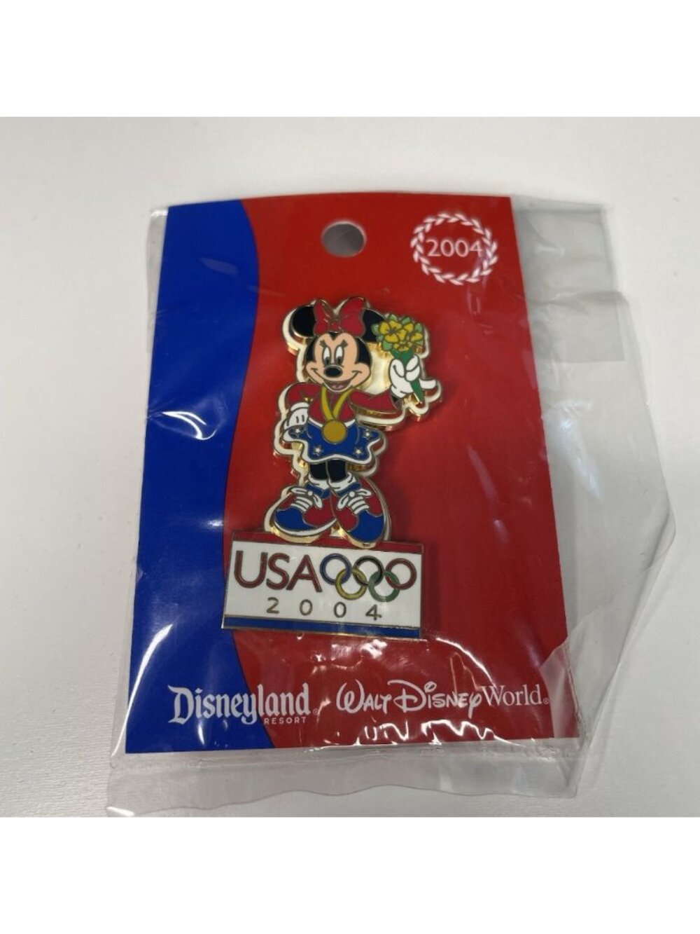 Disney - Olympics 2004 - Minnie Mouse Gold Medal Holding Flowers Pin ON CARD NEW